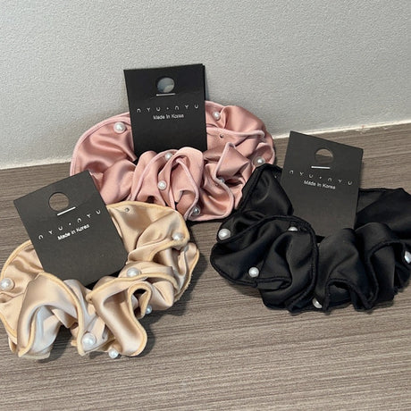 Set of three elegant satin scrunchie hair ties with pearls for women
