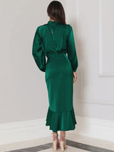 Satin dress without a plunging neckline, long bell sleeves and a ruffled hem