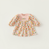 Girls dress with flowers print and tied sleeves