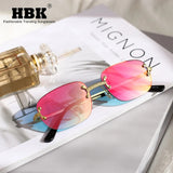 Fashionable classic women's rimless sunglasses with gold clutches