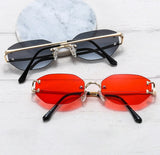Sunglasses with classic oval lenses and elegant gold frame