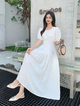 Long summer dress with short puff sleeves and elastics for the chest and waist