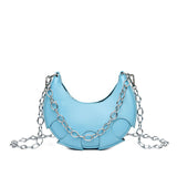 Solid color circle pattern leather bag with silver colored shoulder chain