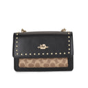 Leather crossbody bag with a front pocket in a different style and a front golden logo studded with gold dots with a chain.