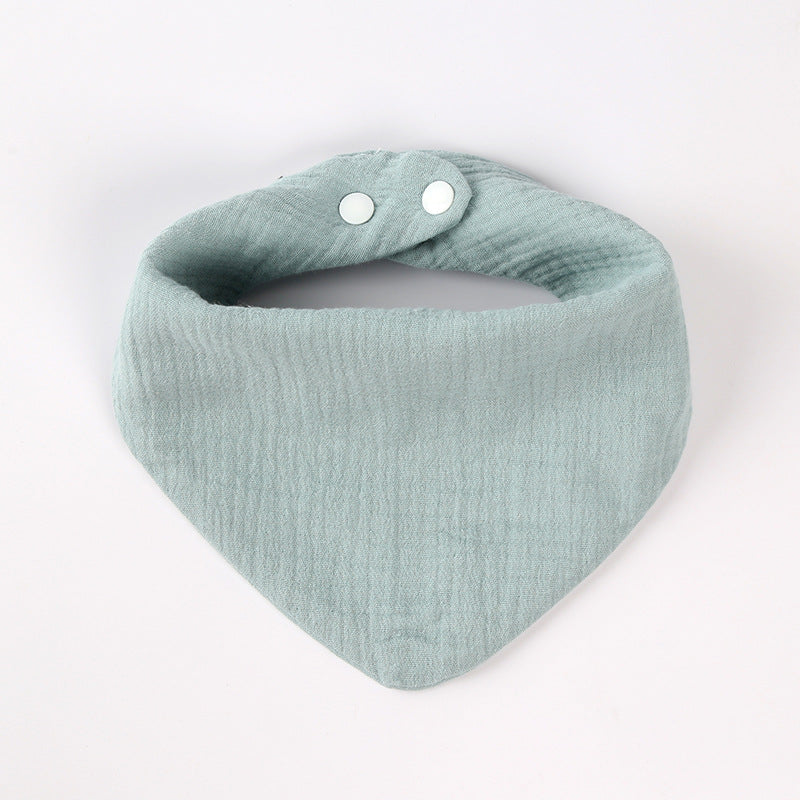 One-piece baby bib made of pure cotton, in the shape of a triangle, in four layers, with buttons at the back, in multiple colors