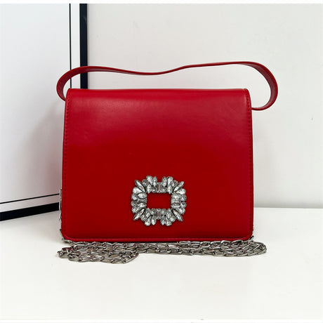 A square leather handbag studded with crystals arranged in a rectangular shape with an additional chain