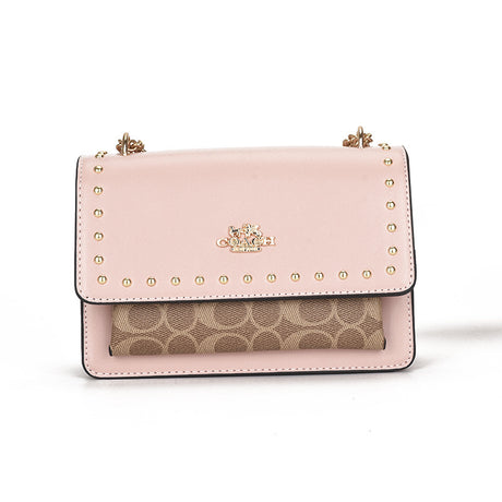 Leather crossbody bag with a front pocket in a different style and a front golden logo studded with gold dots with a chain.