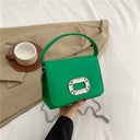 Solid color leather square handbag with crystals arranged in a rectangular shape, with an additional shoulder chain