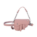 Small triangle saddle leather crossbody bag in solid color