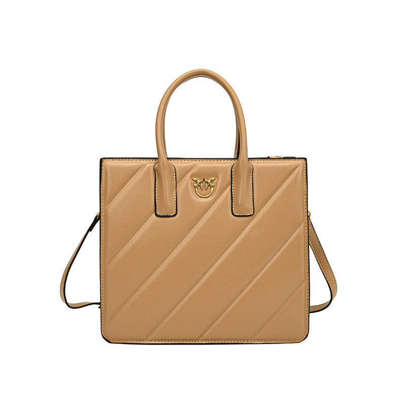 Square crossbody bag in leather with diagonal stitching and a small gold logo