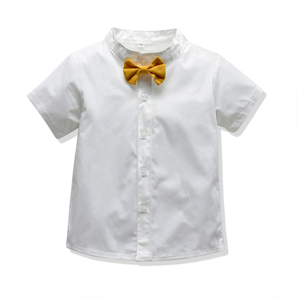 A three-piece set for a boy, a white short-sleeved shirt with yellow shorts and a shoulder strap