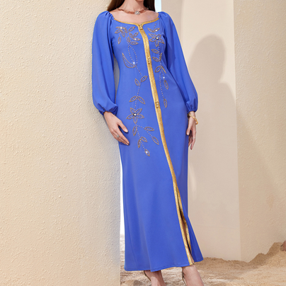 galabia with gold middle line , long buffy sleeves and gold flowers embroidery
