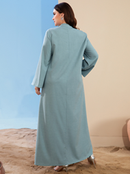 loose glabiya in light blue color with long sleeves and collar
